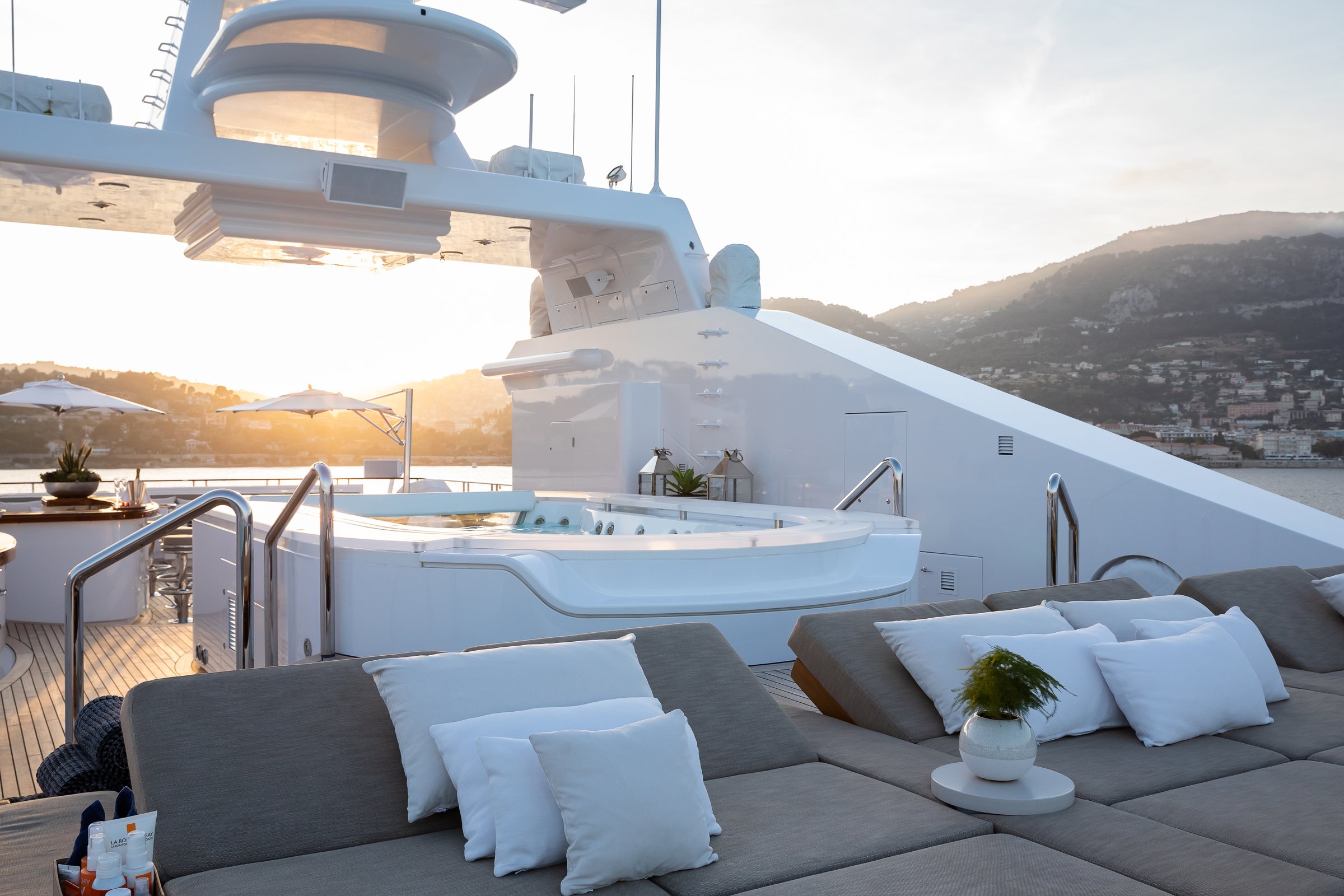 Sunlit superyacht skylounge deck